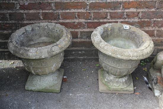 Pair composition stone urns